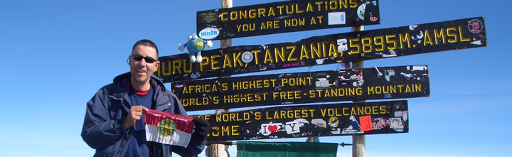 Frank Hulsman on the summit of Mt. Kilimanjaro
